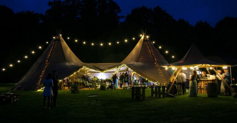 Tipi and marquees with drop festoon